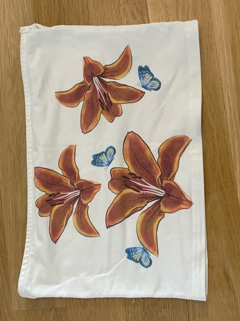 Edikted White Crop Top with Orange Floral & Blue Butterfly Print